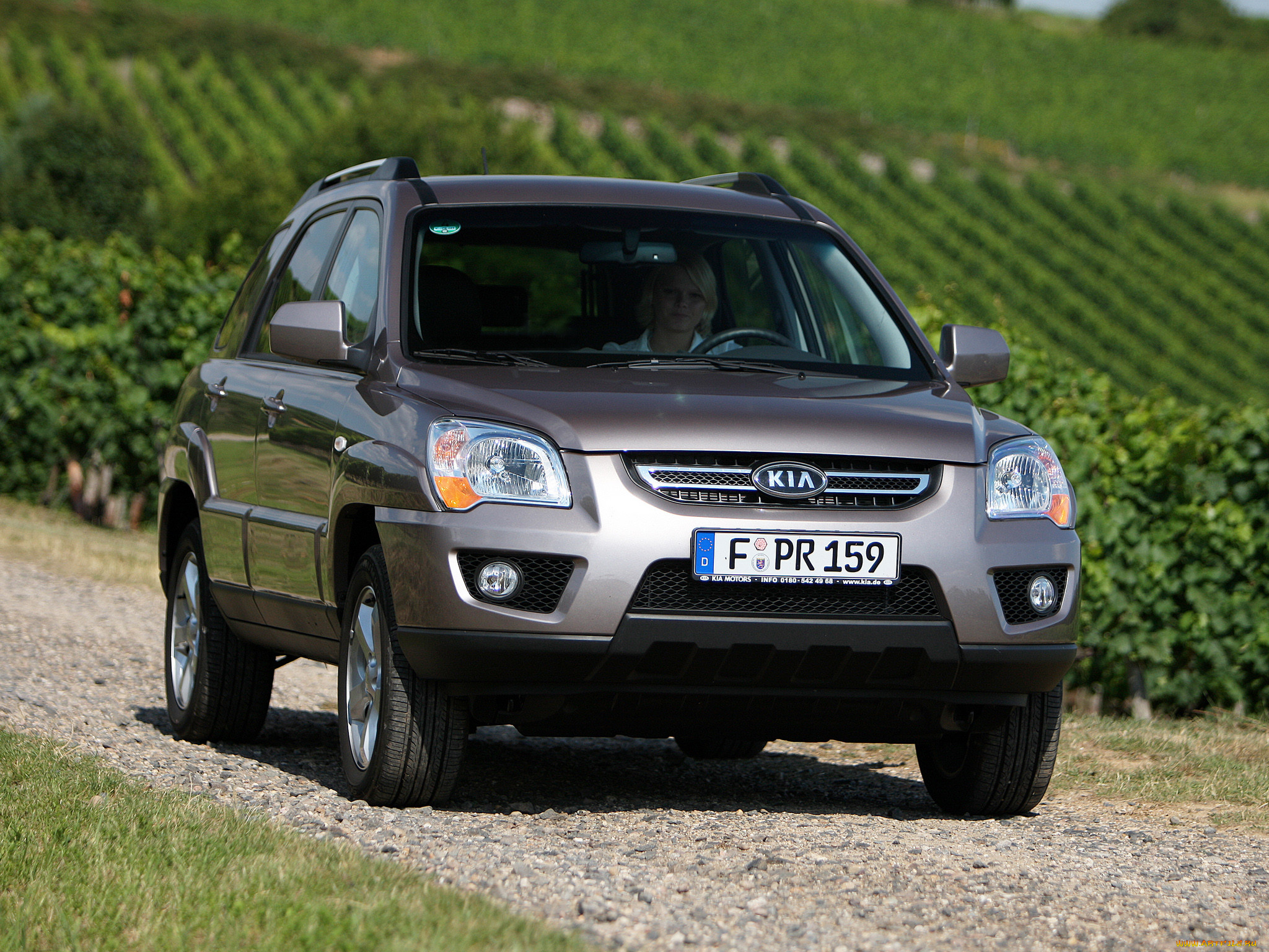 Sportage (II) 2004-2010. Зеленая Киа Спортейдж обои.